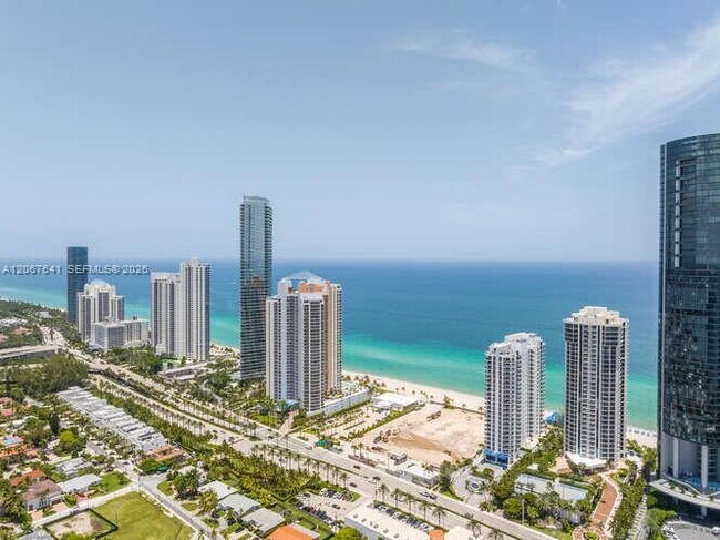 Building Photo - 18671 Collins Ave