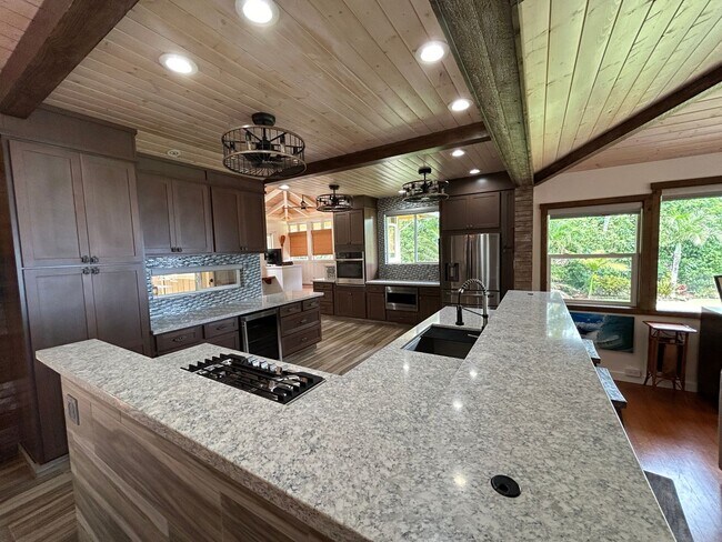 Building Photo - $2500 off 1st Months Rent!! Furnished 3 Bedroom 3 Bath Ocean View Home