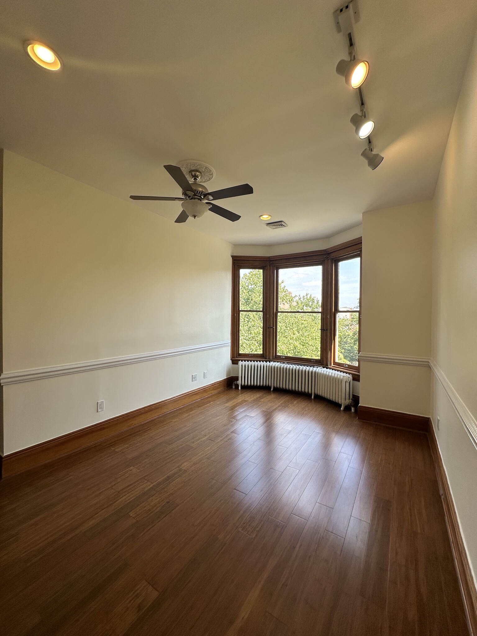 Bedroom 2: rack lighting and fan - 2329 W Grace St