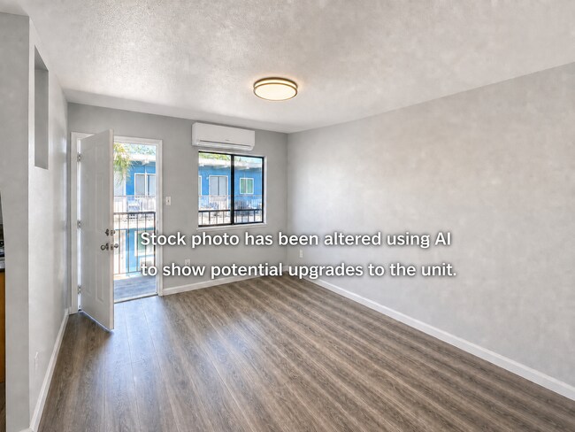 Building Photo - Corner & 1st Floor - Location, location, location! Become the newest neighbor at Palm Garden Apar...