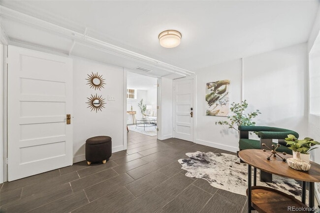 Building Photo - "Spacious 5-Bedroom Gem with Hardwood Floors & Cozy Fireplace in Denver's Heart!"