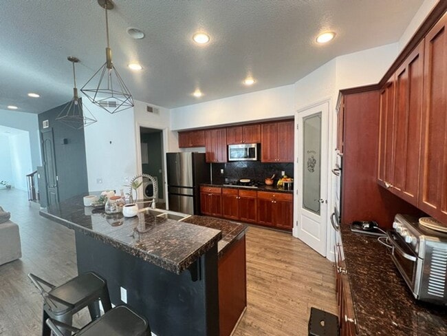 Building Photo - Spacious Four Bedroom Home off Veterans Parkway