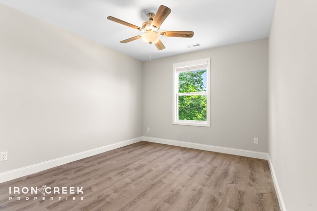 Building Photo - Bright and Modern: New Construction Three-...