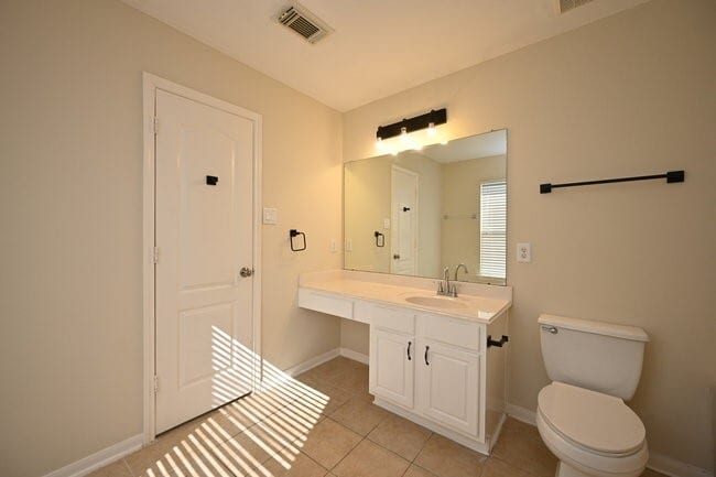 Building Photo - 9403 Coatsworth Dr