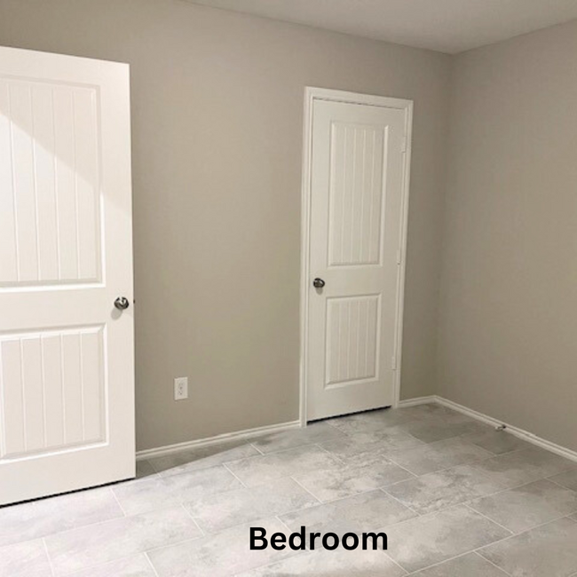 Tiles in all bedrooms, no carpet anywhere - 8310 Rose Petals Ln