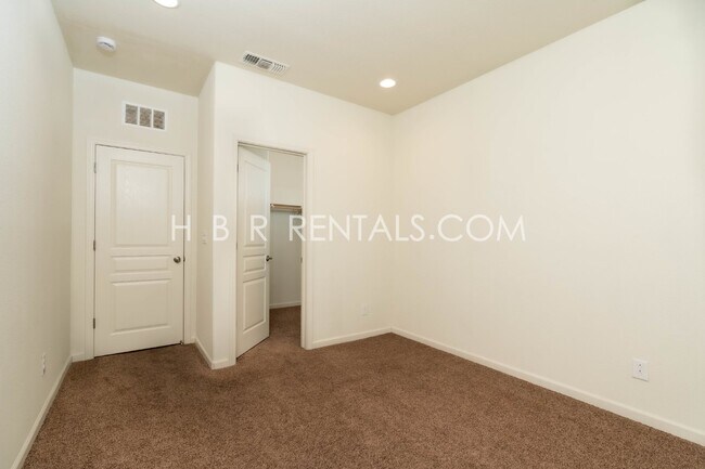 Building Photo - Spacious 4-Bedroom with Granite Finishes in Tracy – Your Dream Home Awaits!