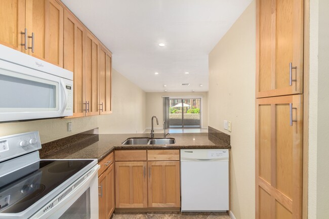 Building Photo - Remodeled 2-Bedroom, 2-Bath Condo in Prime...