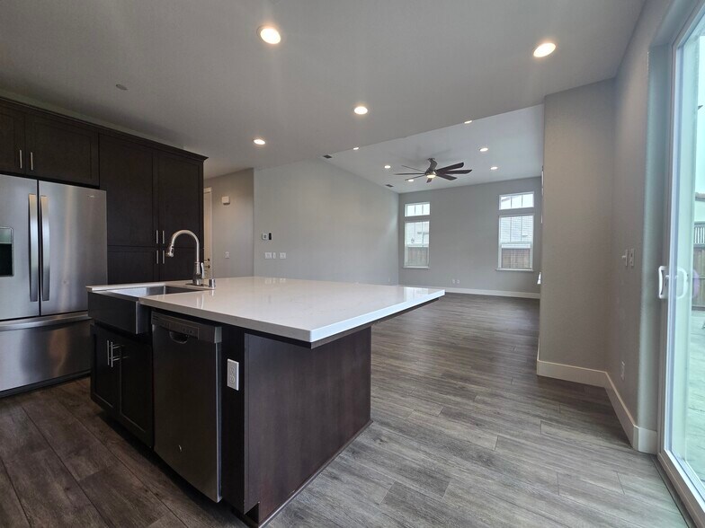 Great room from kitchen - 1429 Brody Bird Ln