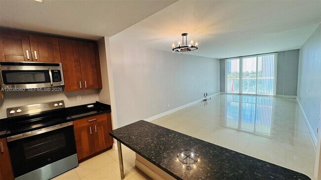 Building Photo - 19390 Collins Ave
