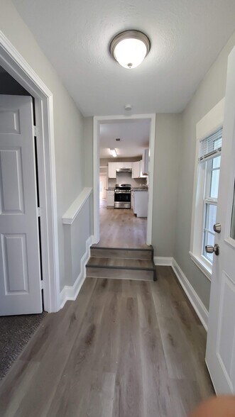 Entering home from backdoor (doorway on left is back bedroom) - 320 S Ashbel St