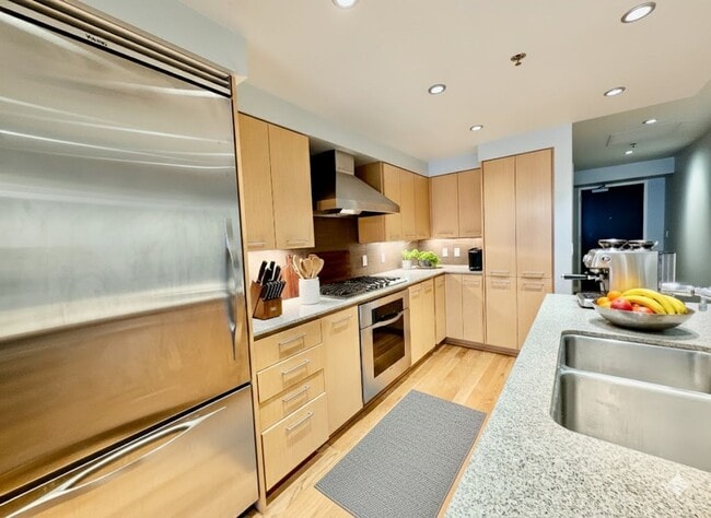 Building Photo - Exquisite Condominium at the Renowned Waterfront Pearl with Views of the River, Work Out Facility...