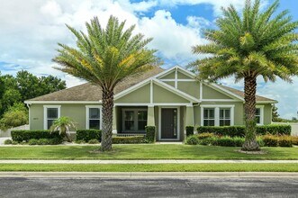 Building Photo - Expansive 4 bedroom, 3 bath remodeled home in gated community