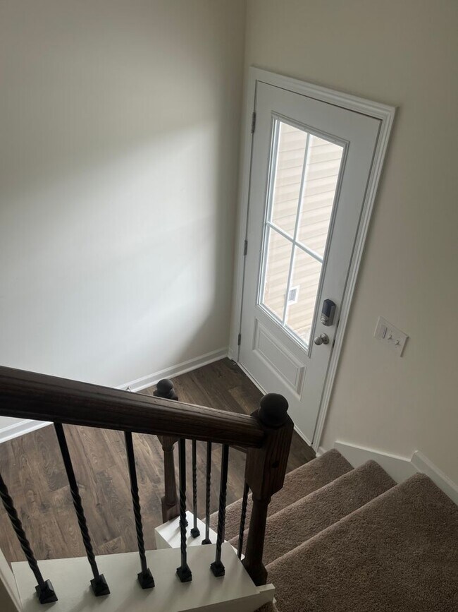 Building Photo - Brand New Townhome – Modern Comfort & Conv...