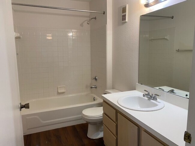 Building Photo - Stylish 2 Bed, 2 Bath Condo with New Vinyl...