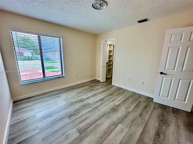 Building Photo - 10940 SW 143rd Ct