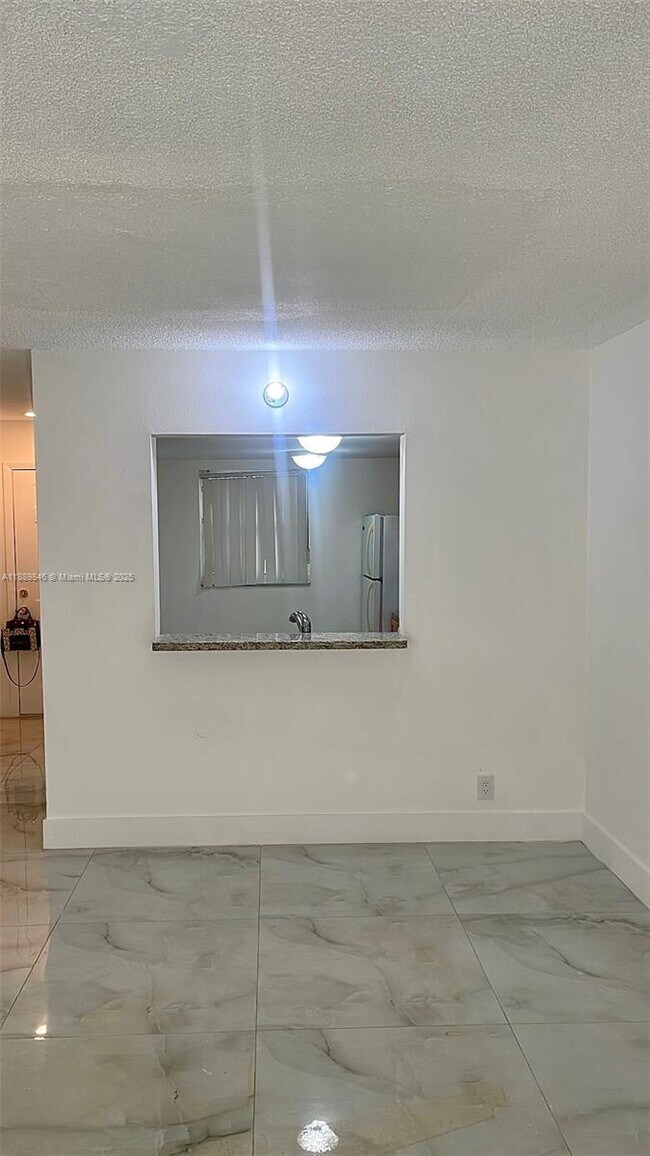Building Photo - 18111 NW 68th Ave