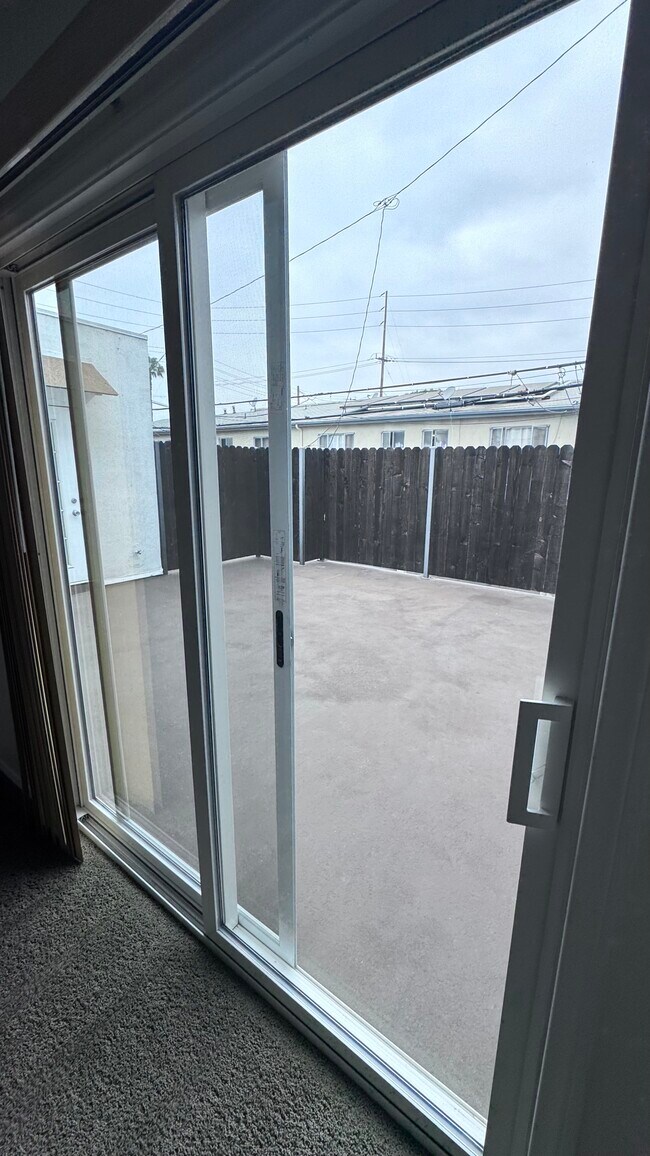 Second bedroom patio door - 11983 Walnut Ln