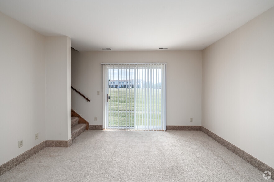 2BR, 1.5BA - 1,024SF - Living Room - Pleasant Creek Meadows