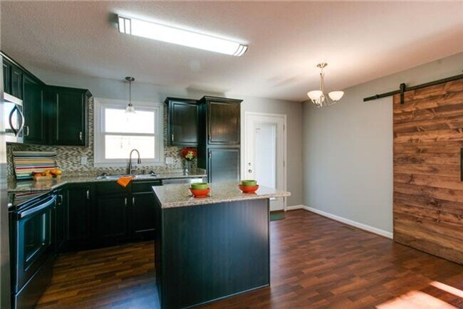 Building Photo - For Rent – Spacious 4 Bedroom Home Near Fo...