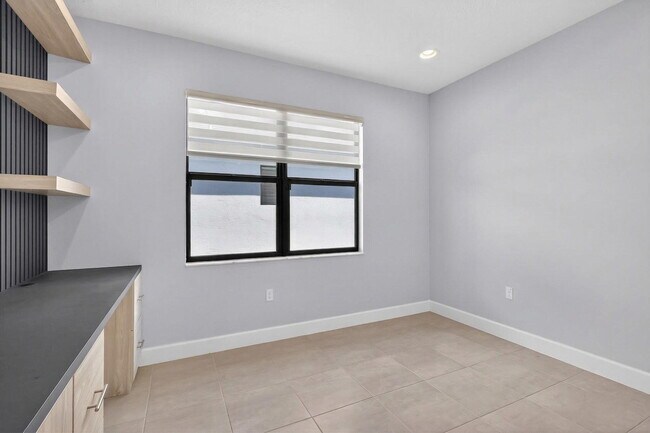 Building Photo - 12719 SW Blue Mangrove Pkwy