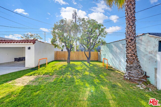 Building Photo - 9115 S Hobart Blvd