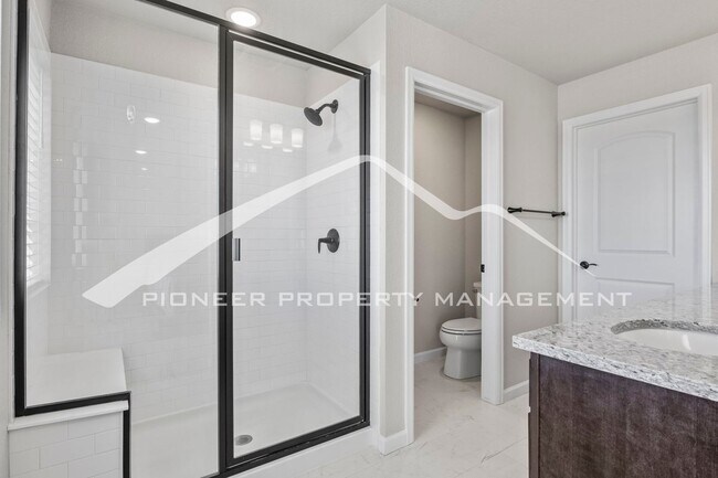 Building Photo - Contemporary Townhome in the Vibrant Interquest Low Maintenance Community with 2 car garage, Wash...
