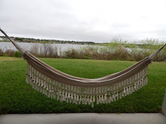 Building Photo - **Charming 4BR/2BA Pond-View Home with Boat Ramp Access – East Orlando **