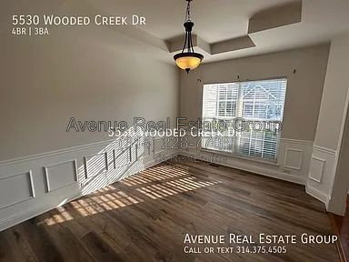 Building Photo - 5530 Wooded Creek Dr