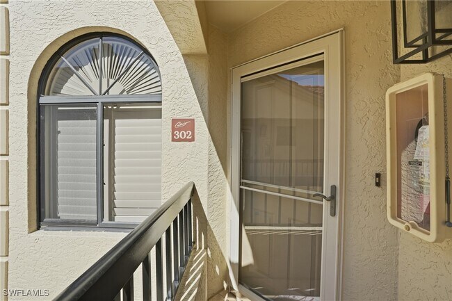 Building Photo - 7048 Pelican Bay Blvd