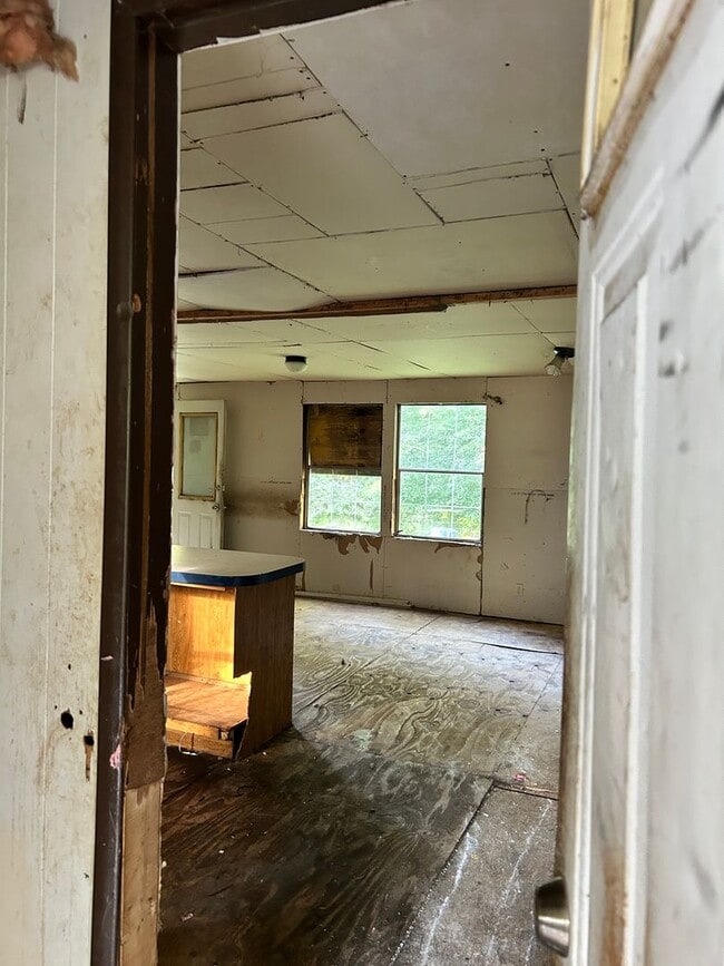 Building Photo - Now Available!  - $690 Month / $900 Down Country setting.