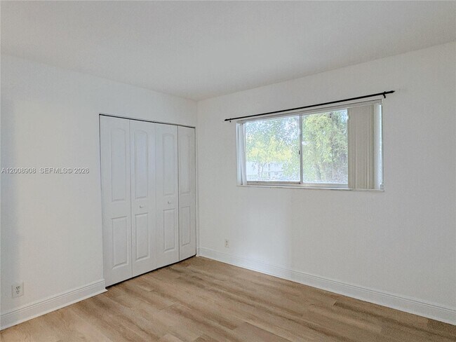 Building Photo - 8550 N Sherman Cir