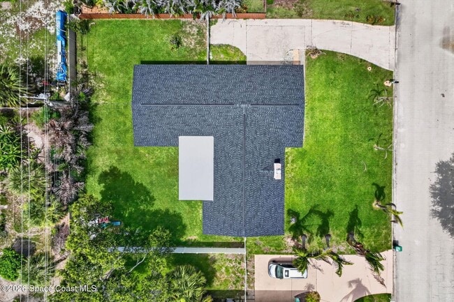 Building Photo - Welcome to this beautifully remodeled 4-bedroom, 3-bath home in the heart of Indialantic Beach!