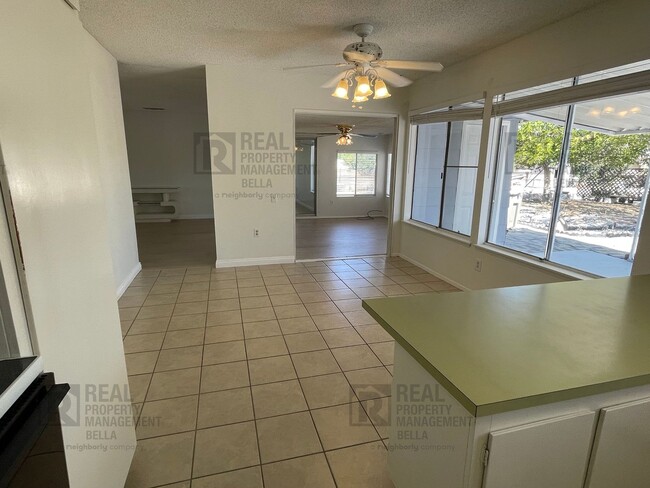 Building Photo - 55+ Community Gem: Open Floor Plan, Large Backyard & Clubhouse Amenities