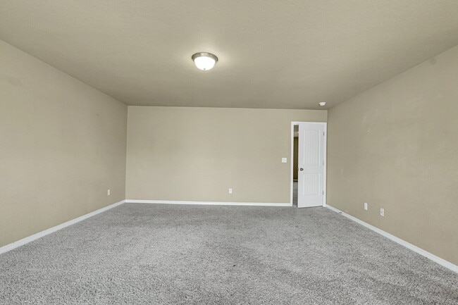 Building Photo - $2,540.95 - 4 Bed, 2.5 Bath Home in CO Springs with Fenced in Yard and 3 Car Garage!