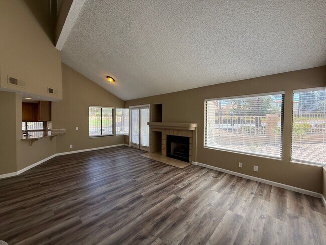 Building Photo - TWO BEDROOM TOWNHOME IN THE LAKES WITH GARAGE AND ATTACHED CARPORT