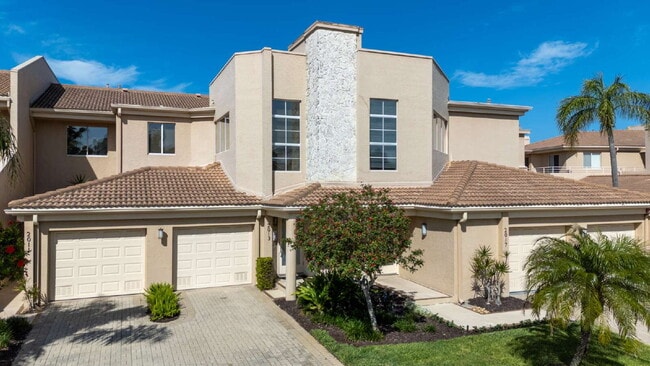 Building Photo - Luxury Furnished Longboat Key Retreat with Private Beach Club Access & Golf Course Views Remodele...