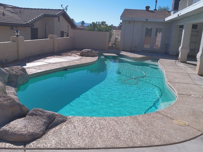 Building Photo - Stunning Lake Havasu Rental 4 BR/ 3BA Pool Home Backing to Park
