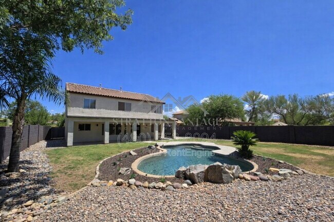 Building Photo - 1005 E Stirrup Ln