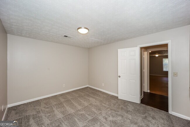 Building Photo - 6155 Forrest Ave