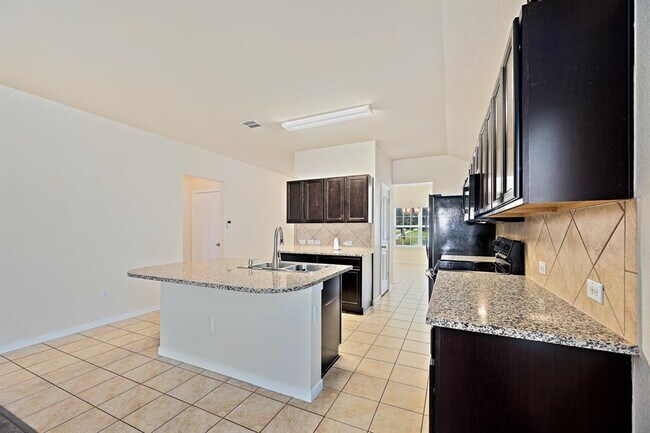 Building Photo - 5916 Montrelia Dr