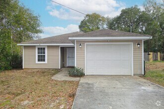 Building Photo - Corner Lot 3 Bedroom Home Off Gulf Beach H...