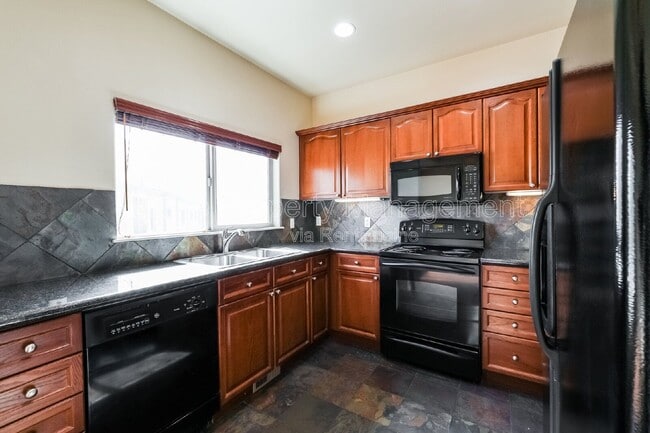 Building Photo - 3155 E 104th Ave