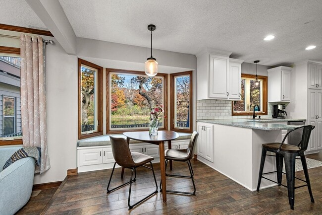 Building Photo - Stunning Remodeled 4BR Home w/ Pond View & 3-Seasons Porch!