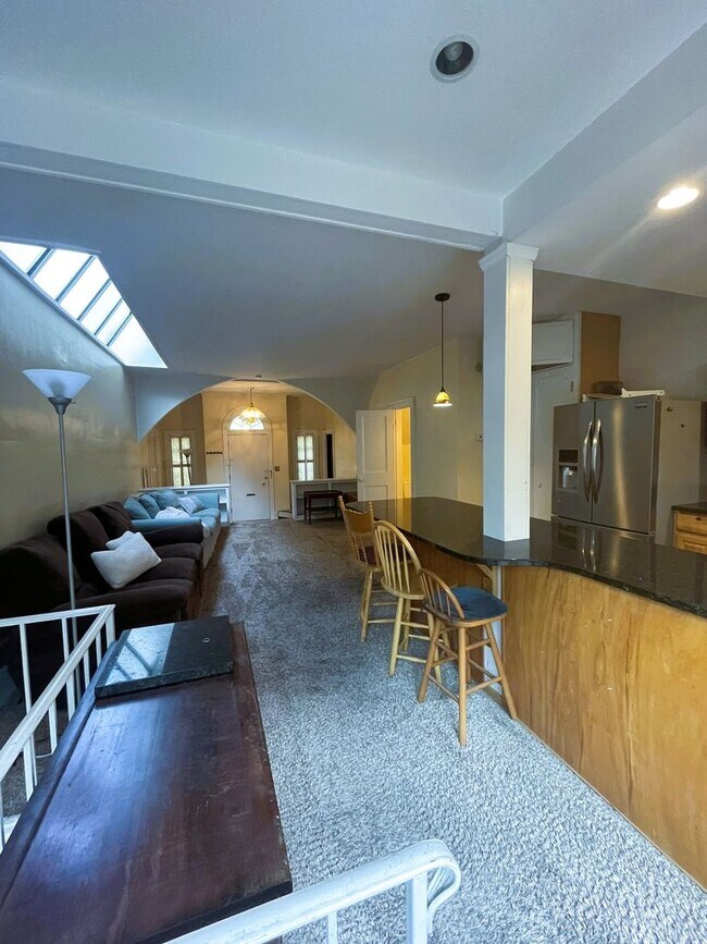 Building Photo - One Block to the Diag! Charming Home with Private Courtyard + Parking