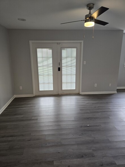 Living room and back door - 7984 Shady Oak Trl