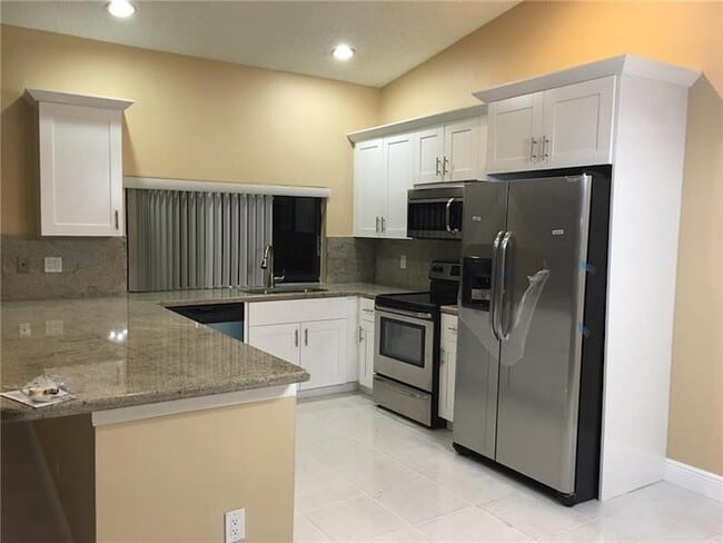 Building Photo - 9555 NW 25th Ct