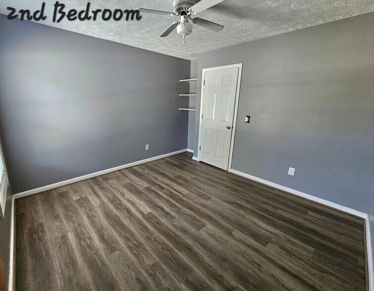 2nd Bedroom is located in the middle of house, near 2nd full bathroom - 2127 Winter Moss Ln