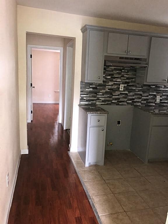 stainless steel fridge and oven - 3204 Napoleon St