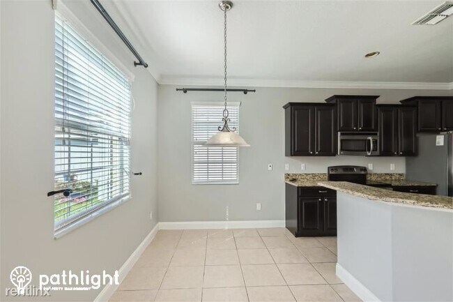 Building Photo - 3 br, 2.5 bath House - 6804 Butterfly Driv...