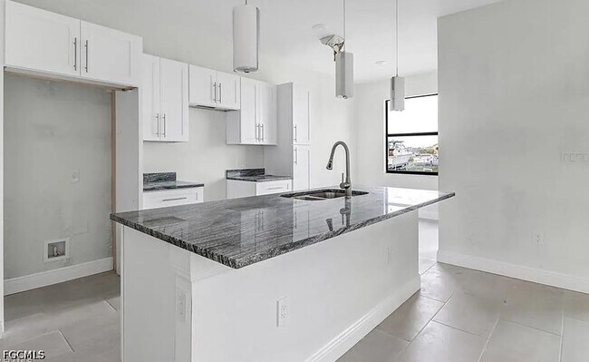 Building Photo - 408 Chiquita Blvd N